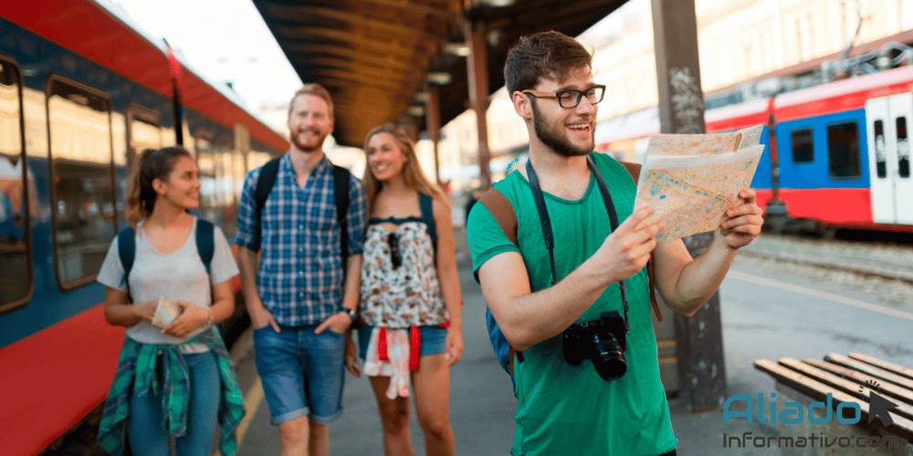 Jóvenes viajando en tren con el programa Verano Joven 2025, descuentos en transporte público para menores de 30 años